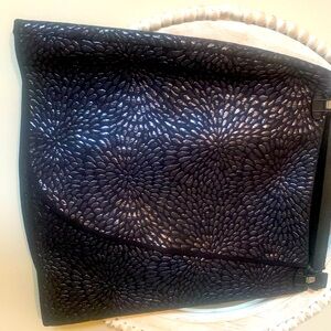 Very cute black skirt from the Loft. Has opening flap in front.